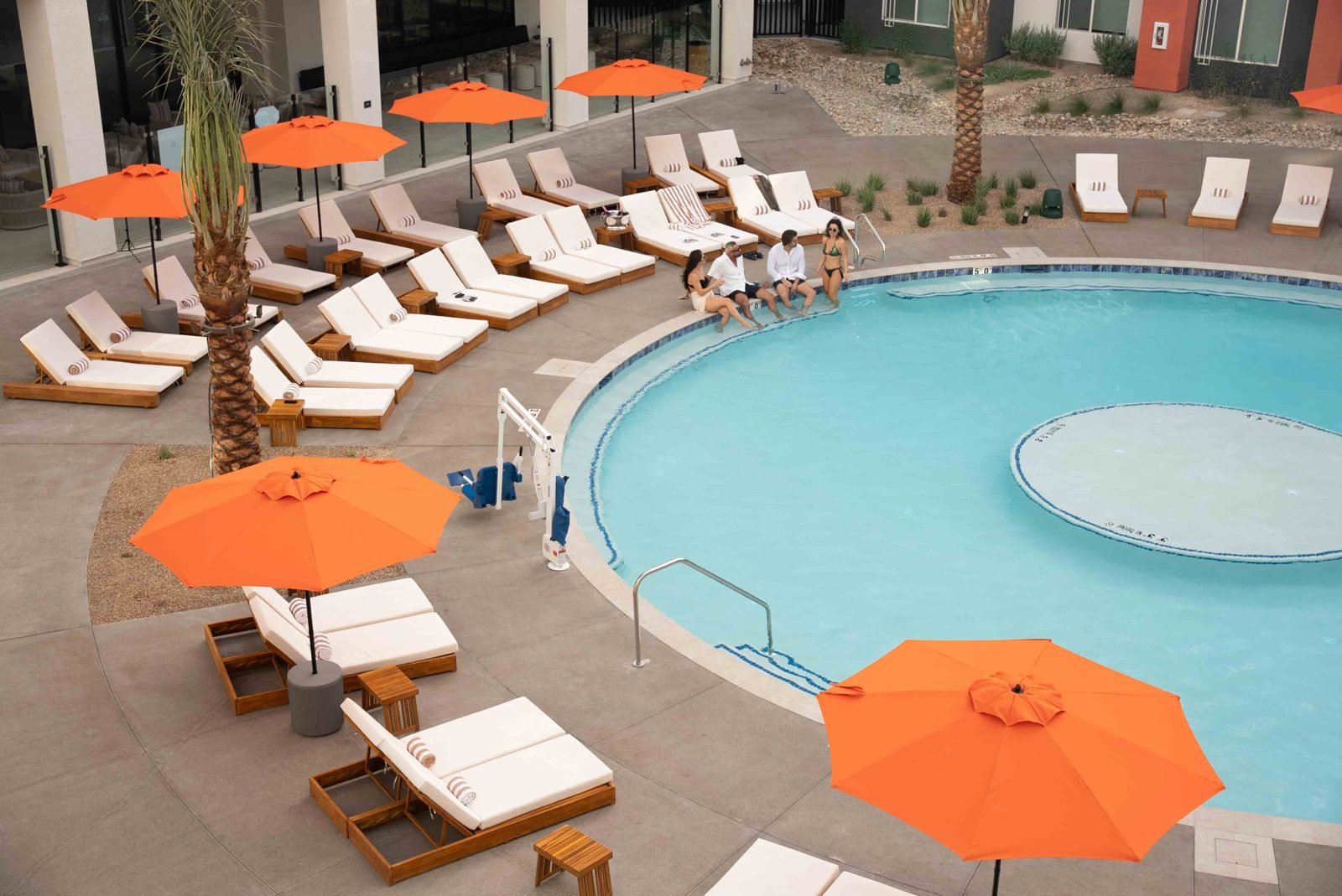 Aerial view of the Otonomus pool deck with loungers and umbrellas