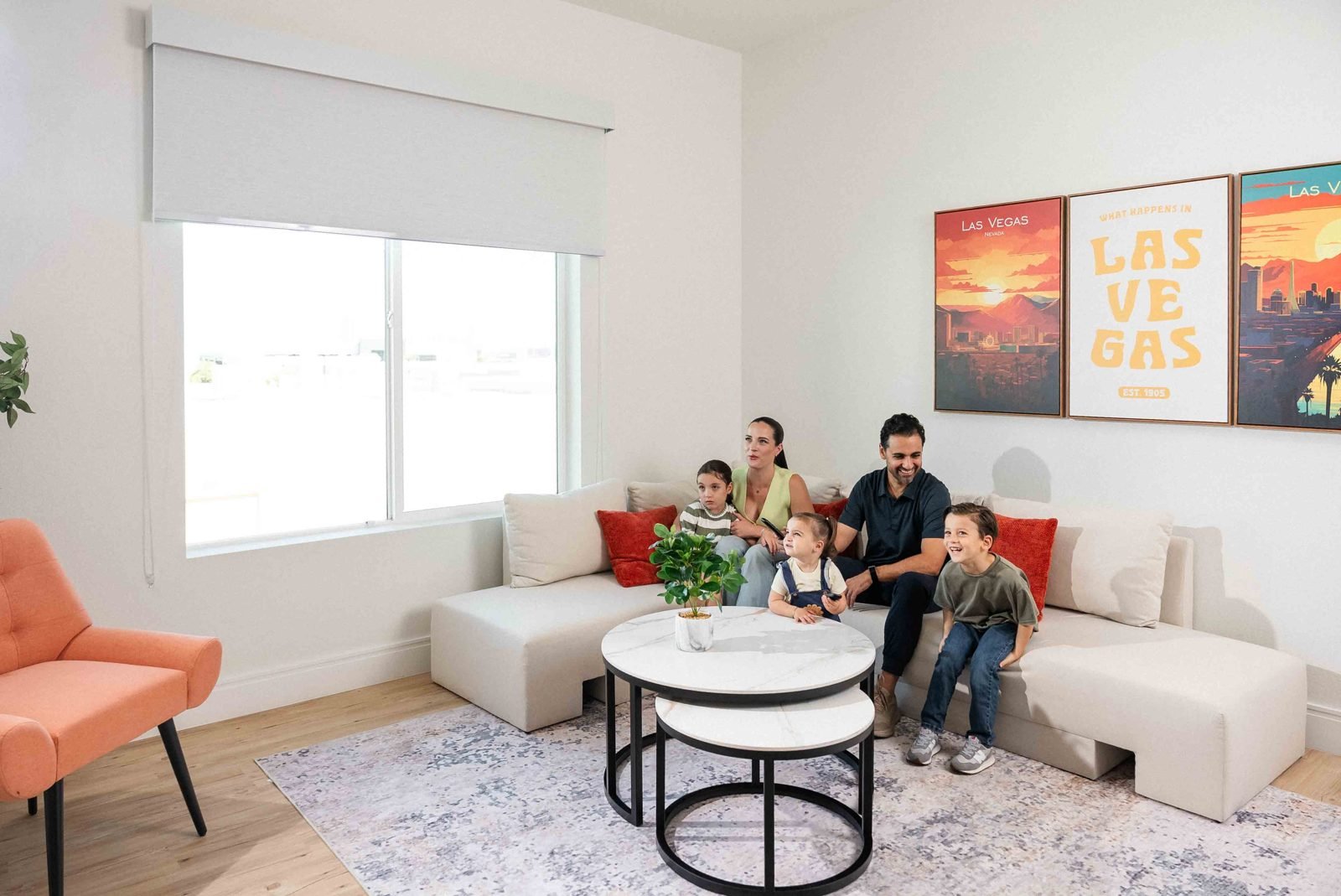 Otonomus residence living room with sectional sofa and nesting tables
